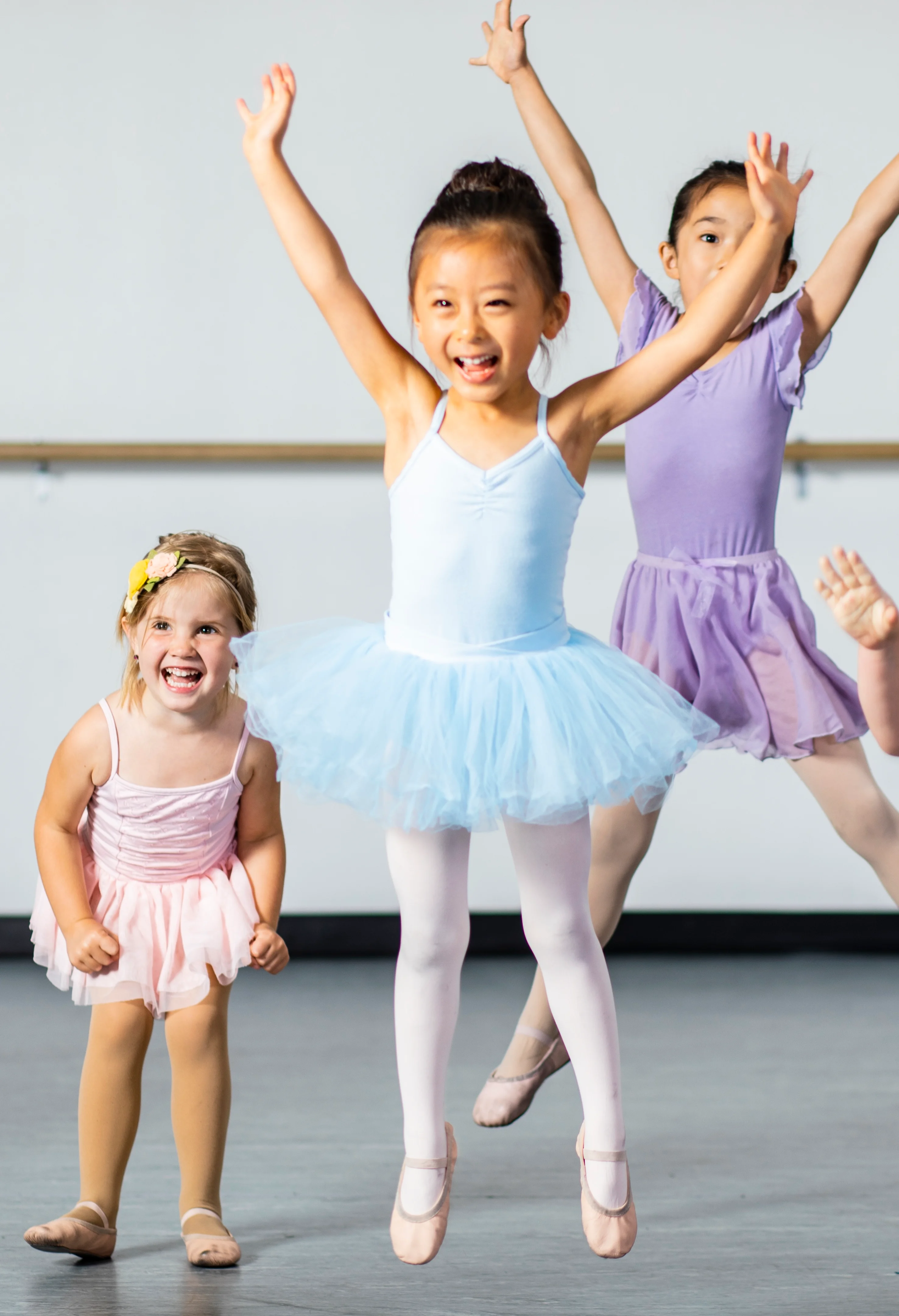 Joyful preschool dancers during class